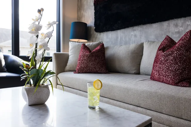 a view of a vase with white flowers