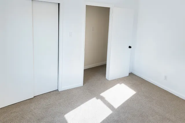 an empty room with windows