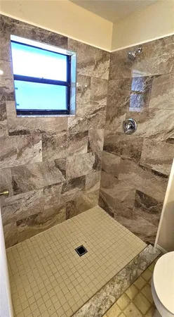 a bathroom with a toilet