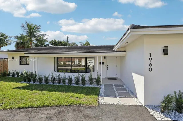 a front view of house with yard