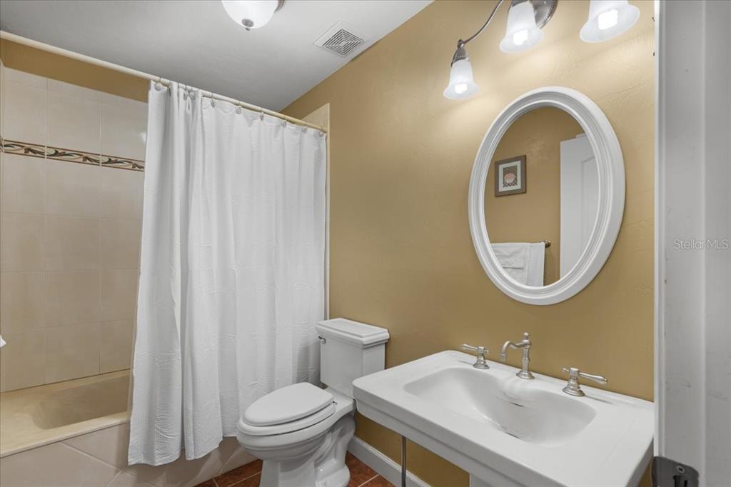4700 Northwest 55th Avenue Bell, FL 32619 - Photo 18 of 77 a bathroom with a sink and a mirror