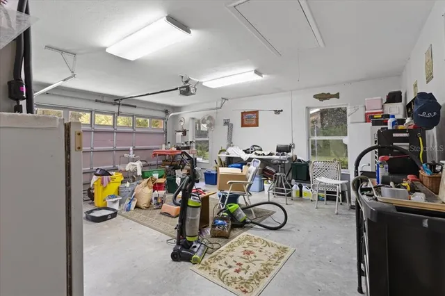 a view of a green field with lots of trees
