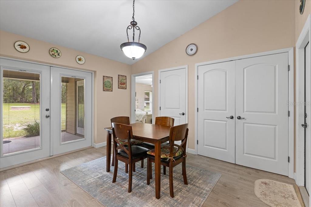 4700 Northwest 55th Avenue Bell, FL 32619 - Photo 9 of 77 a view of a dining room with furniture and window