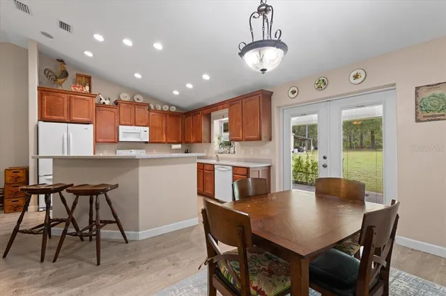 a bathroom with a sink double vanity and a mirror