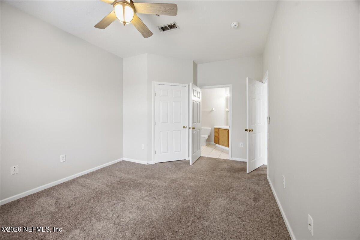 7990 Baymeadows Road East, Unit 422 Jacksonville, FL 32256 - Photo 8 of 17 07-Primary Bedroom