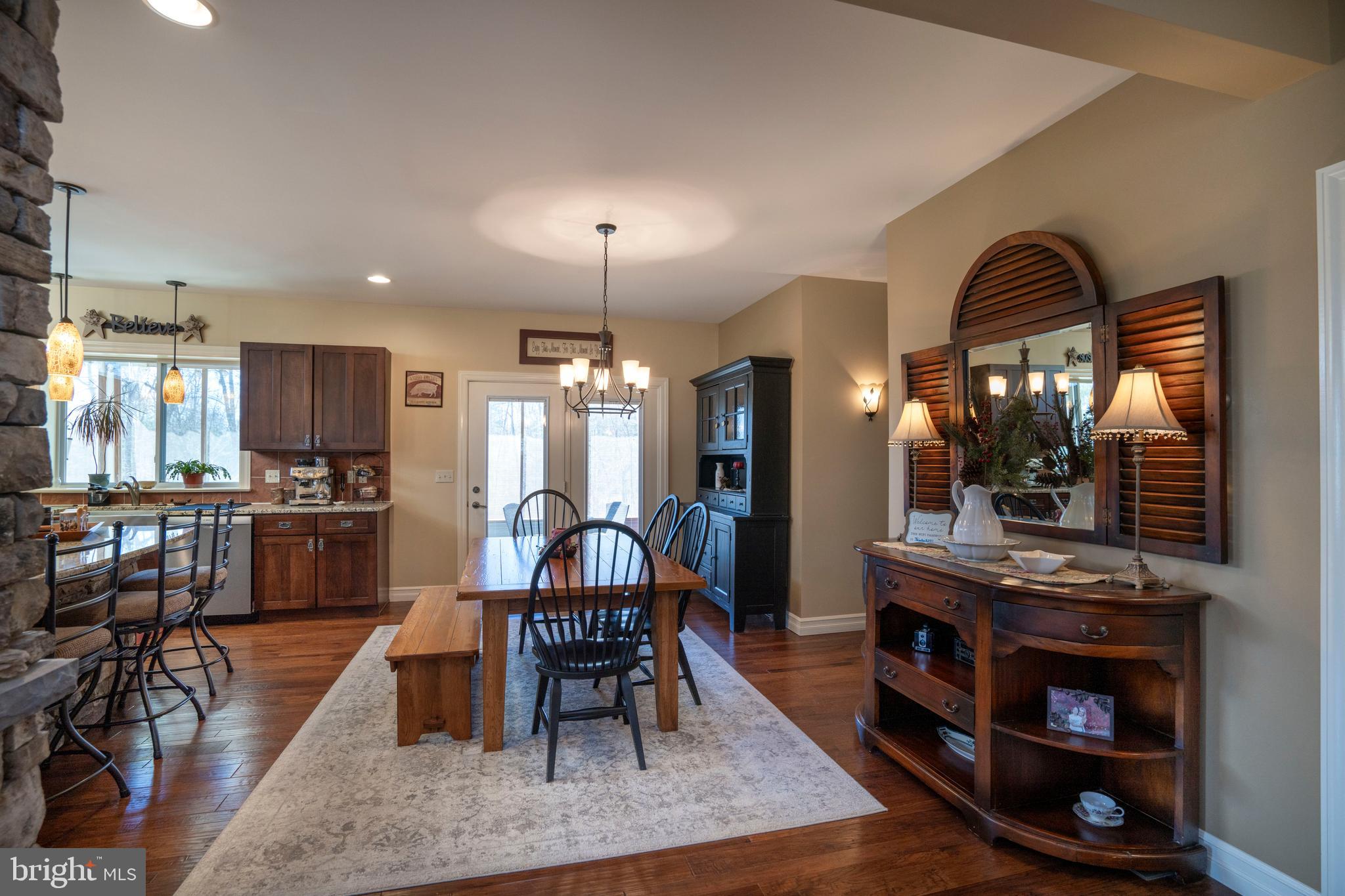10620 Kyper Road Huntingdon, PA 16652 - Photo 23 of 104 a view of a kitchen with dining table and chairs