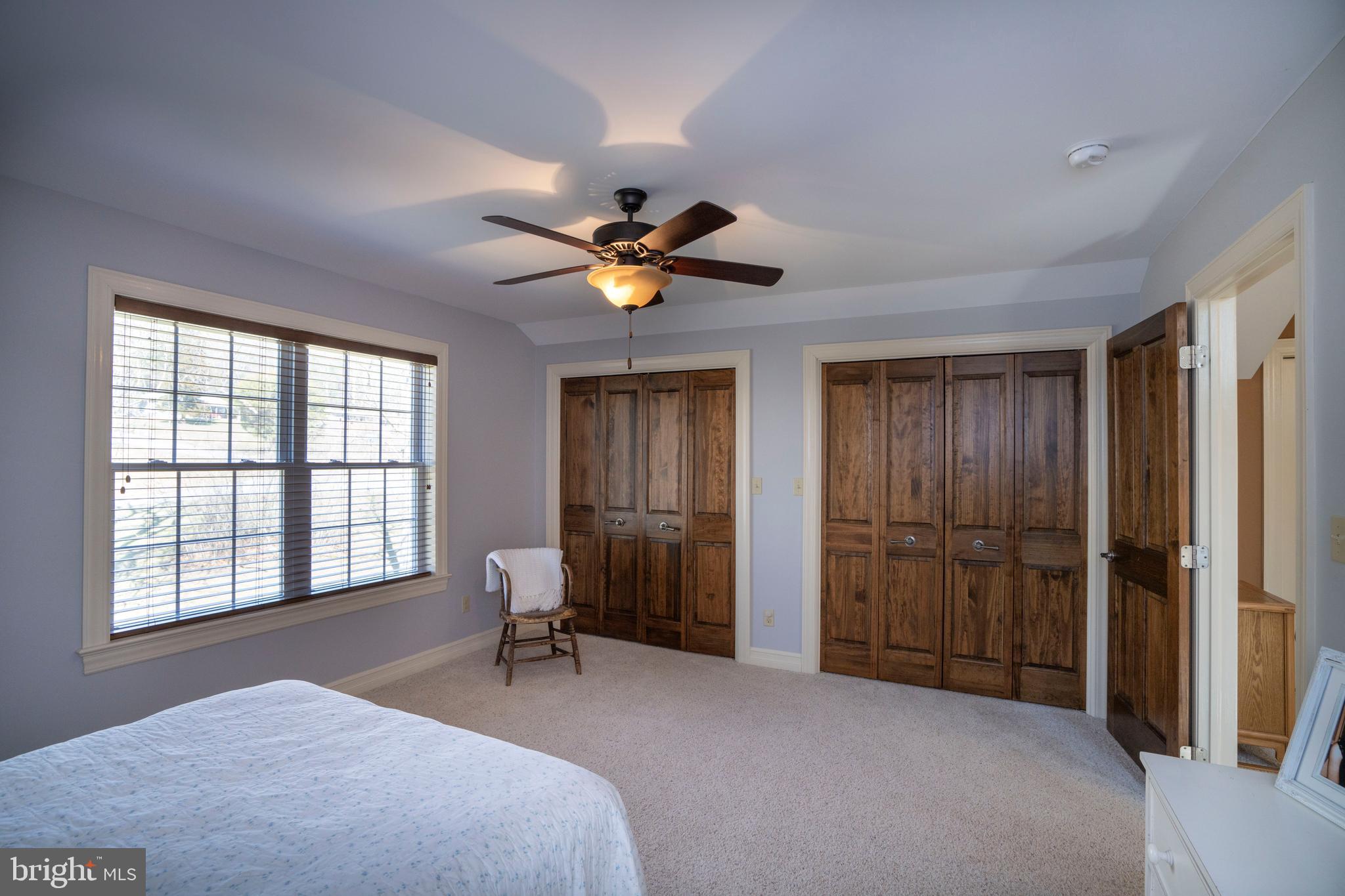 10620 Kyper Road Huntingdon, PA 16652 - Photo 32 of 104 a bedroom with a bed and a large window