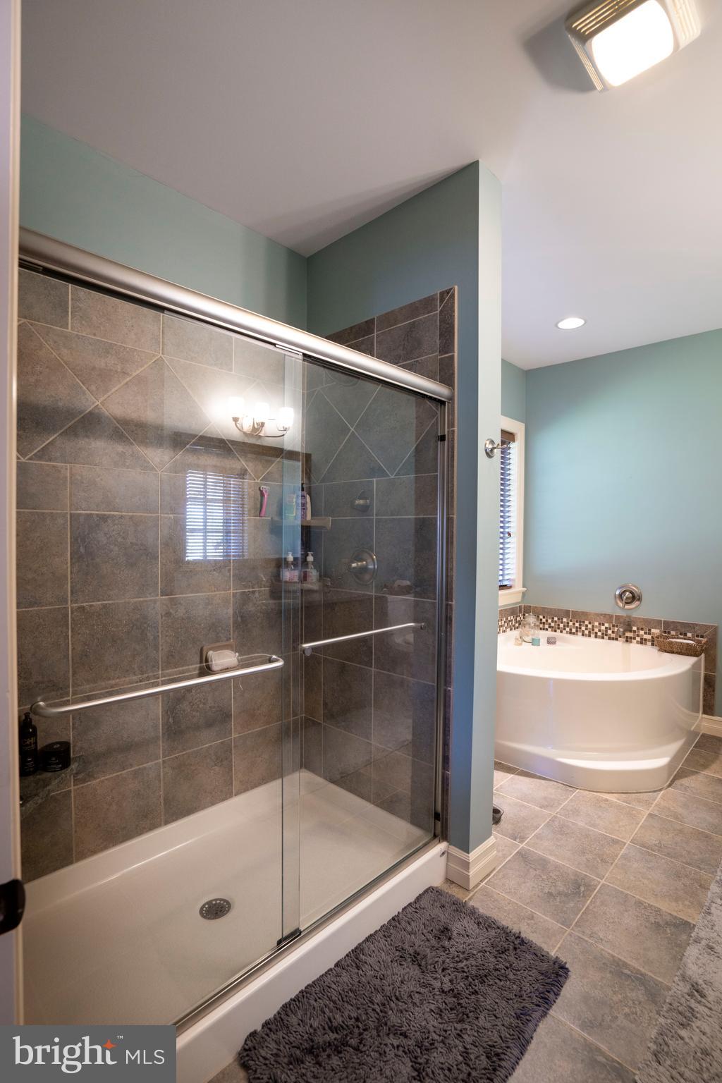 10620 Kyper Road Huntingdon, PA 16652 - Photo 41 of 104 a bathroom with a bathtub and a shower