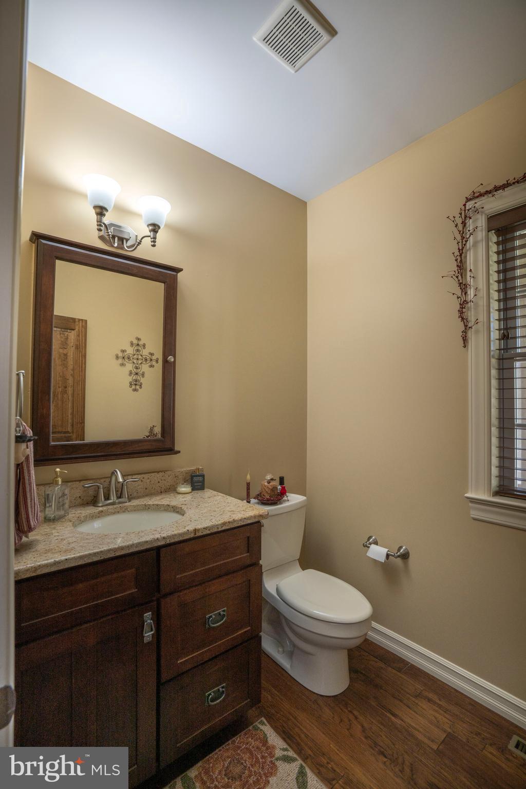 10620 Kyper Road Huntingdon, PA 16652 - Photo 46 of 104 a bathroom with a toilet sink and mirror