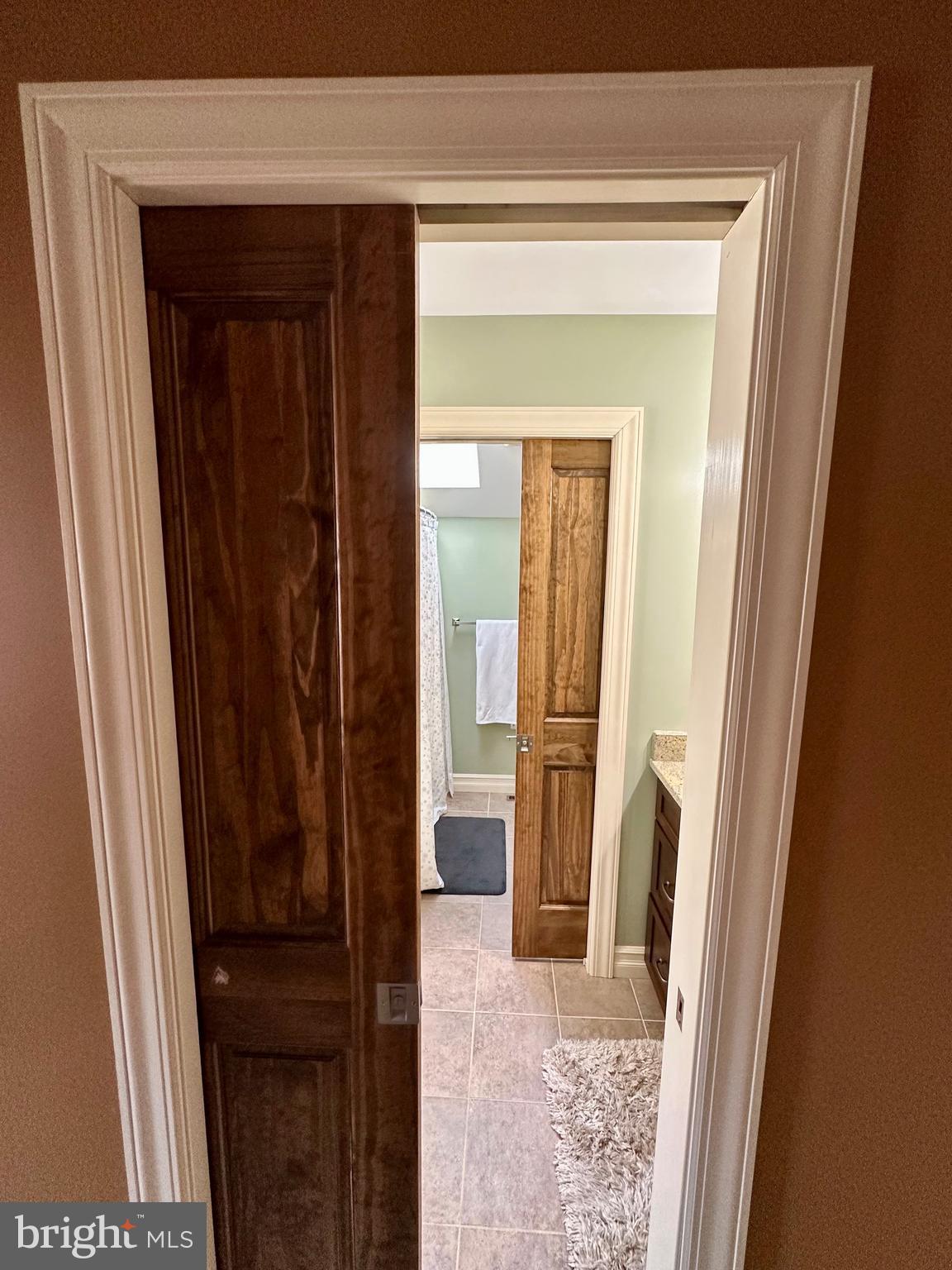 10620 Kyper Road Huntingdon, PA 16652 - Photo 49 of 104 a view of a bathroom from a hallway