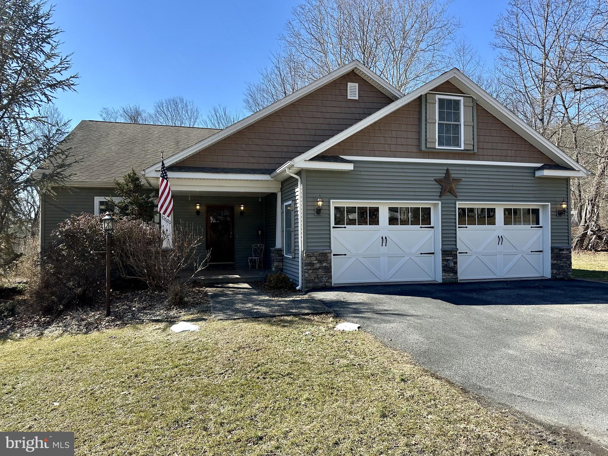 10620 Kyper Road Huntingdon, PA 16652 - Photo 7 of 104 a front view of a house with a yard