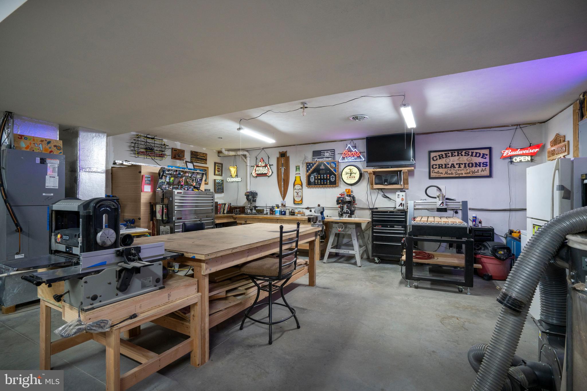 10620 Kyper Road Huntingdon, PA 16652 - Photo 77 of 104 a room with furniture and a flat screen tv