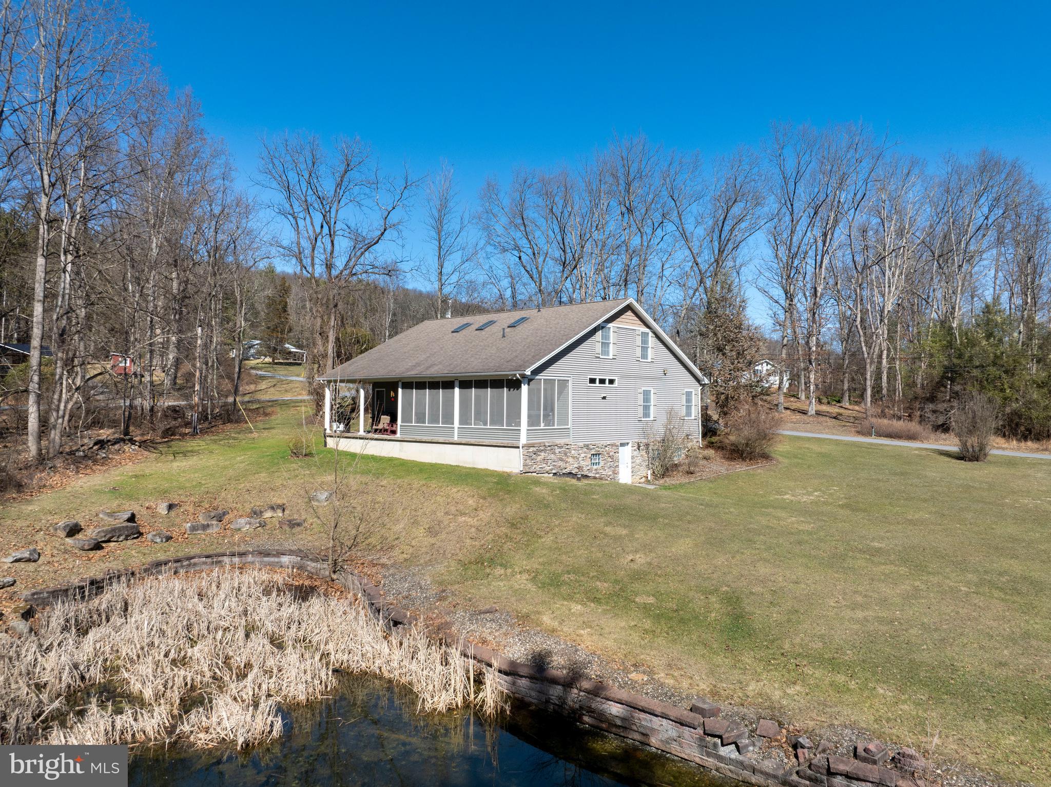10620 Kyper Road Huntingdon, PA 16652 - Photo 87 of 104 a front view of a house with a yard