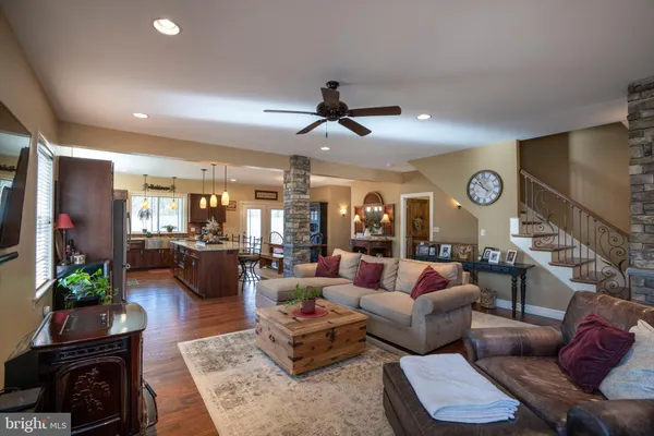 a kitchen with wooden cabinets and a sink