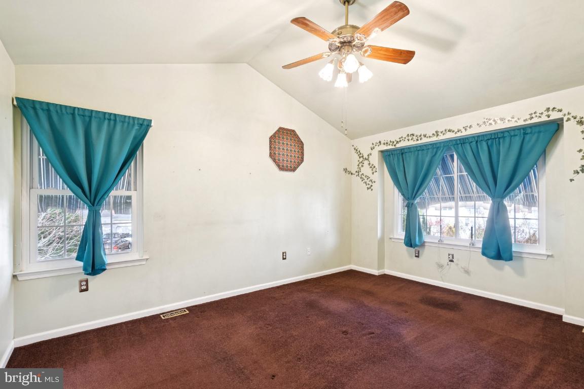 121 Weathervane Drive Mount Royal, NJ 08061 - Photo 11 of 31 an empty room with windows and fan