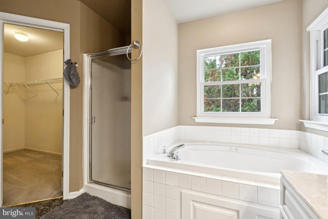 121 Weathervane Drive Mount Royal, NJ 08061 - Photo 13 of 31 a white bath tub sitting next to a window