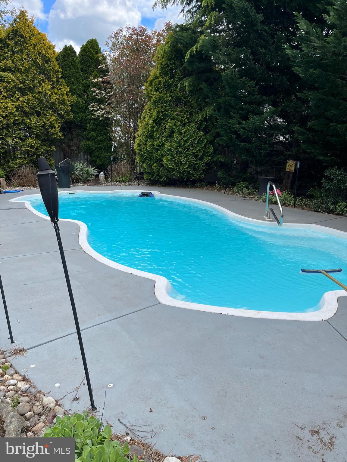 121 Weathervane Drive Mount Royal, NJ 08061 - Photo 23 of 31 a view of a swimming pool with a yard