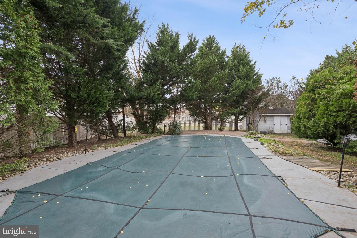 121 Weathervane Drive Mount Royal, NJ 08061 - Photo 29 of 31 a building with trees in front of it