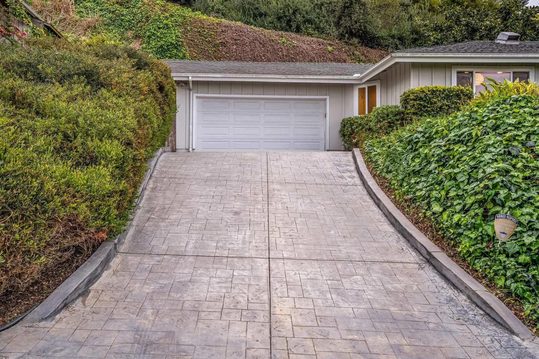 7356 Rue Michael La Jolla, CA 92037 - Photo 15 of 48 a backyard of a house with lots of green space