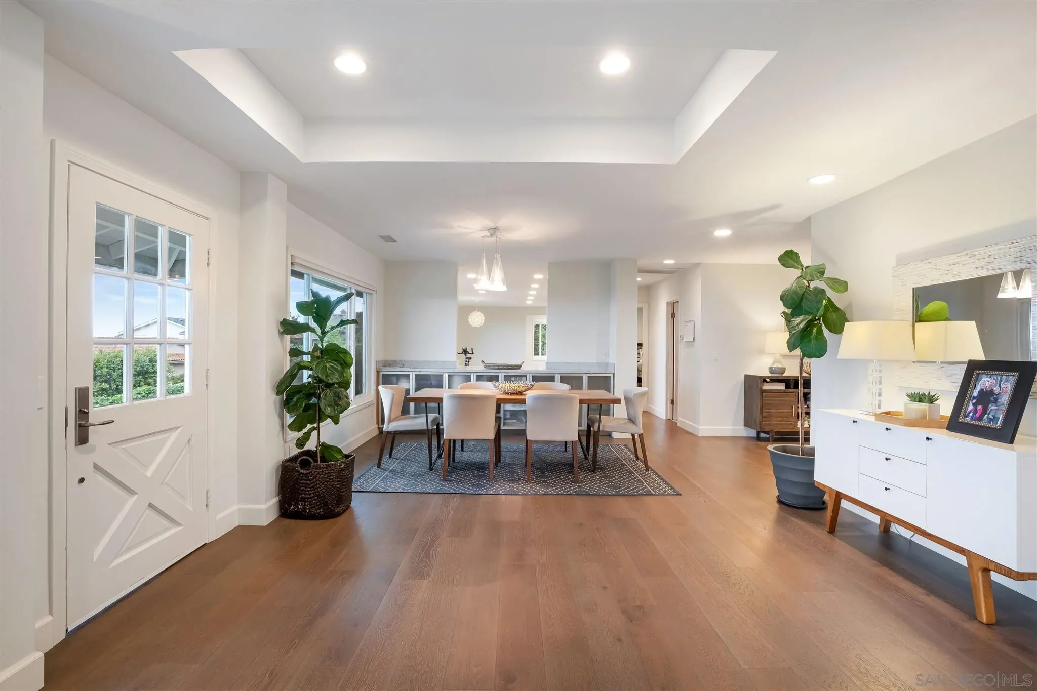 7356 Rue Michael La Jolla, CA 92037 - Photo 18 of 48 a living room with furniture potted plant and windows