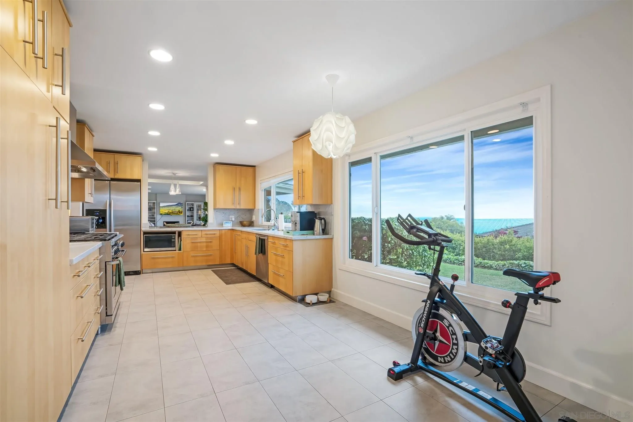 7356 Rue Michael La Jolla, CA 92037 - Photo 27 of 48 a view of a living room and a kitchen