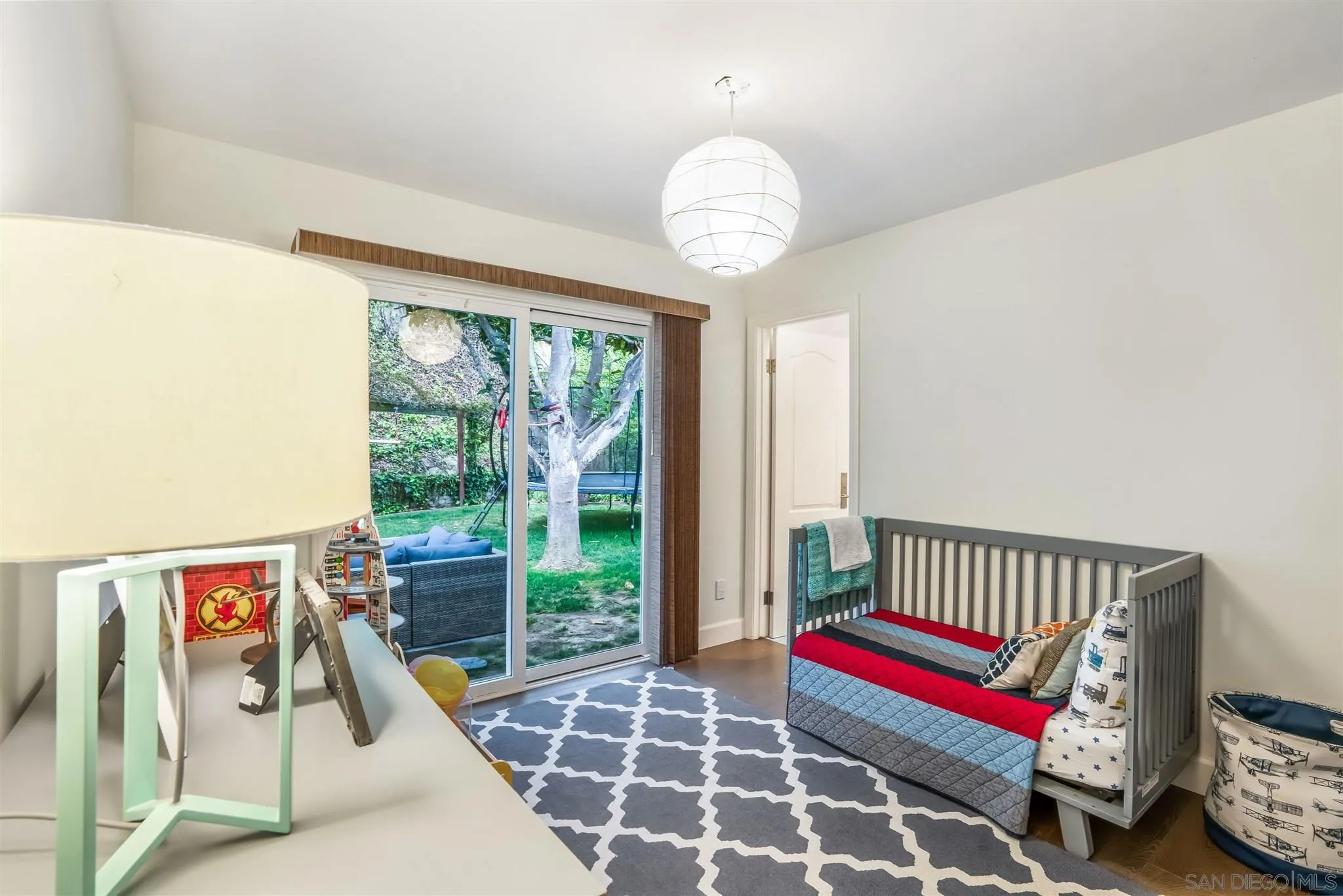 7356 Rue Michael La Jolla, CA 92037 - Photo 32 of 48 a bedroom with furniture and a large window