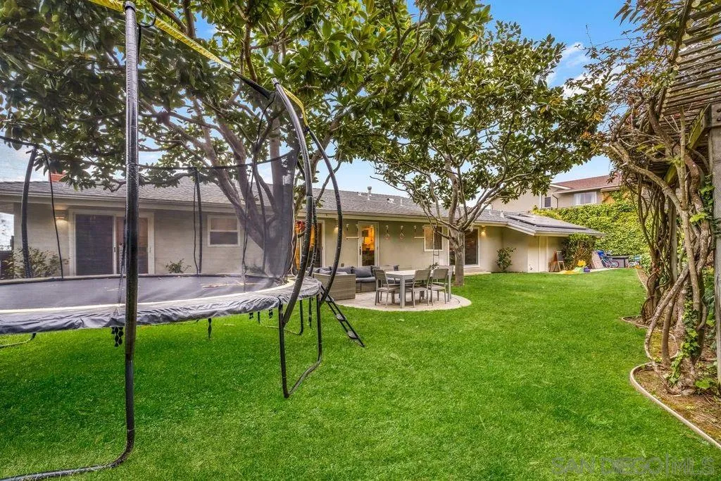 7356 Rue Michael La Jolla, CA 92037 - Photo 42 of 48 a view of a house with a yard porch and sitting area