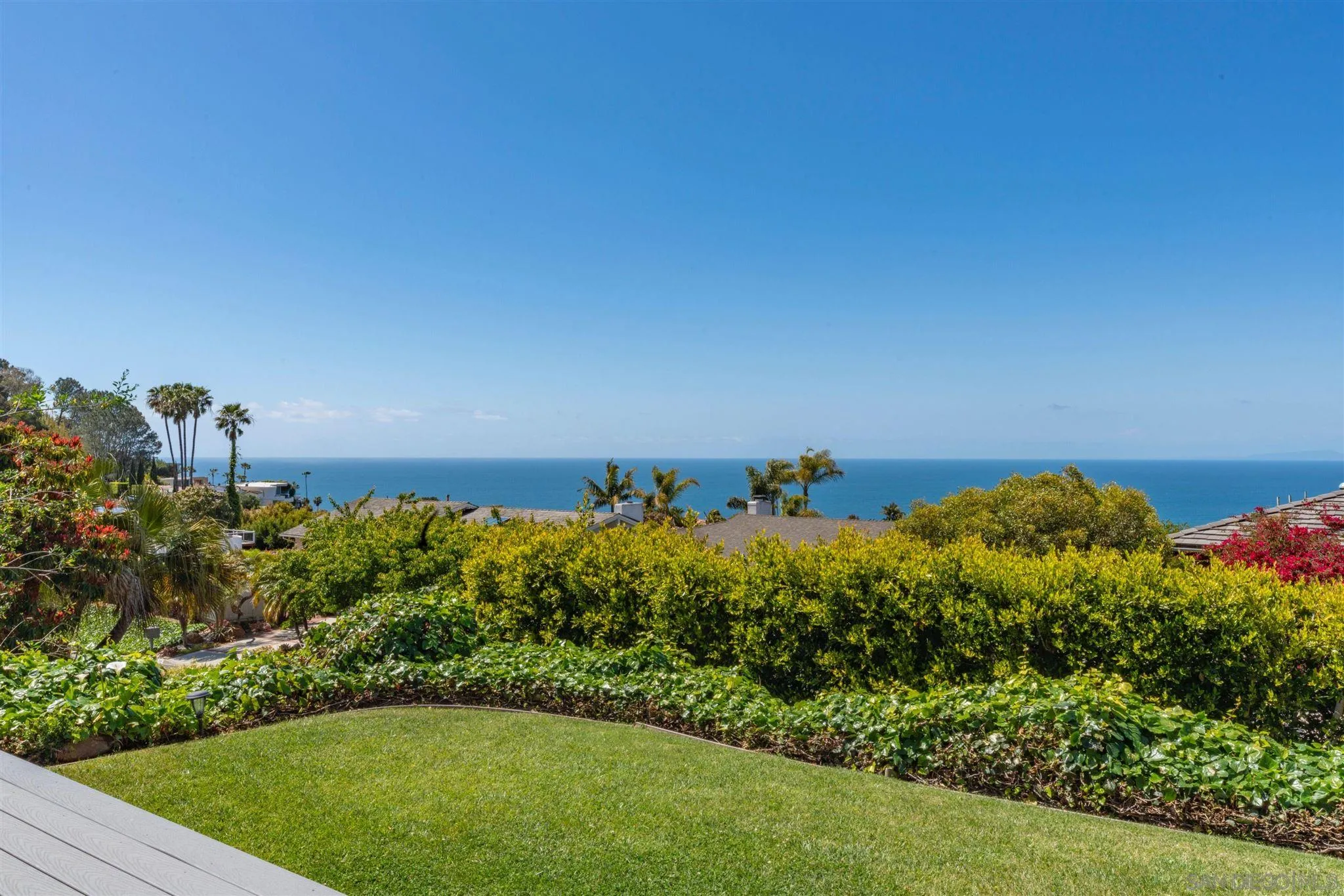 7356 Rue Michael La Jolla, CA 92037 - Photo 5 of 48 a view of a lake with a building in the background