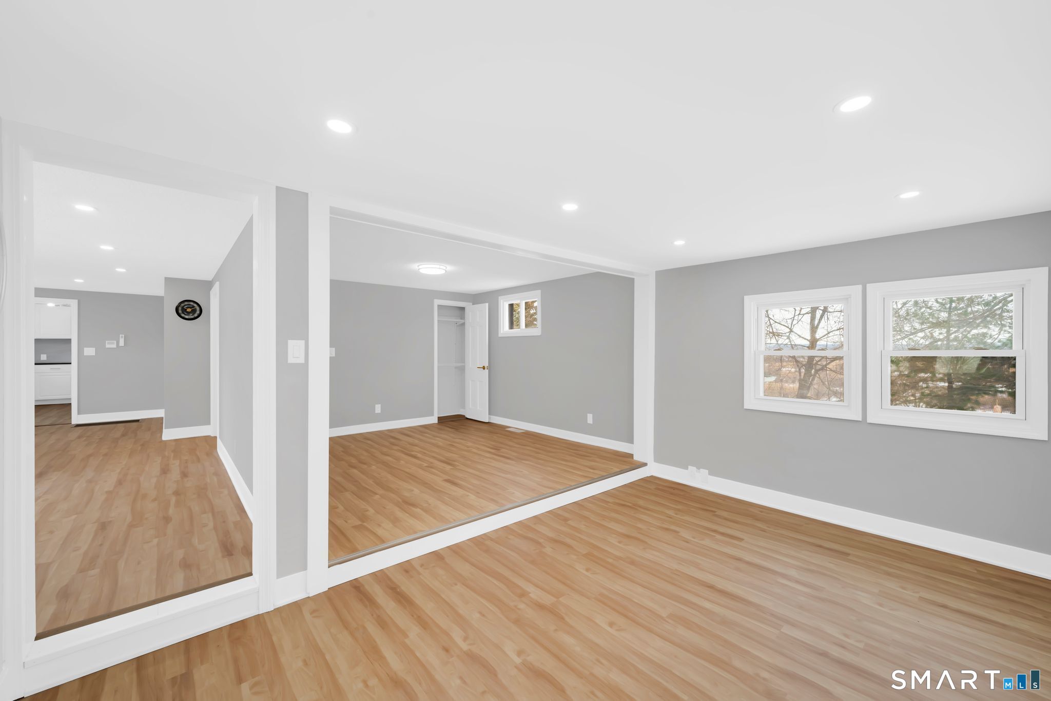 52 Vineyard Road North Haven, CT 06473 - Photo 10 of 24 Sun room off of living room leading to office/den