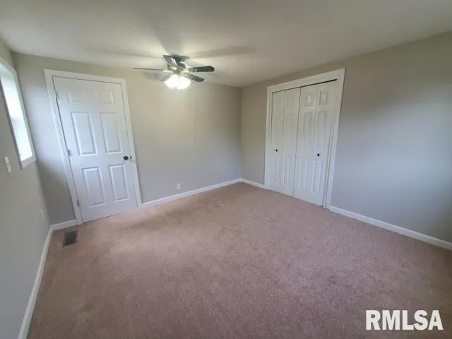 a view of a livingroom with a window