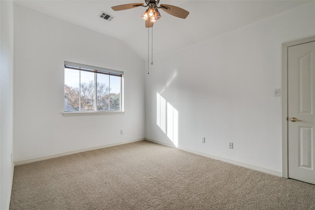 8810 Edgelake Trail Rowlett, TX 75088 - Photo 13 of 20 a view of an empty room with a window