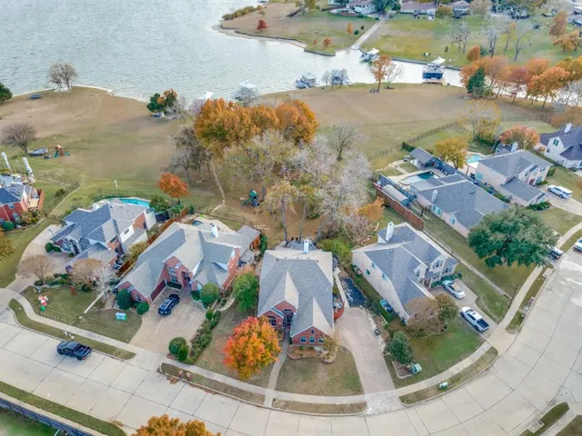 an aerial view of a house with a ocean view
