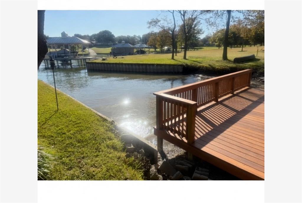 8810 Edgelake Trail Rowlett, TX 75088 - Photo 18 of 20 a view of swimming pool with lawn chairs and lake view