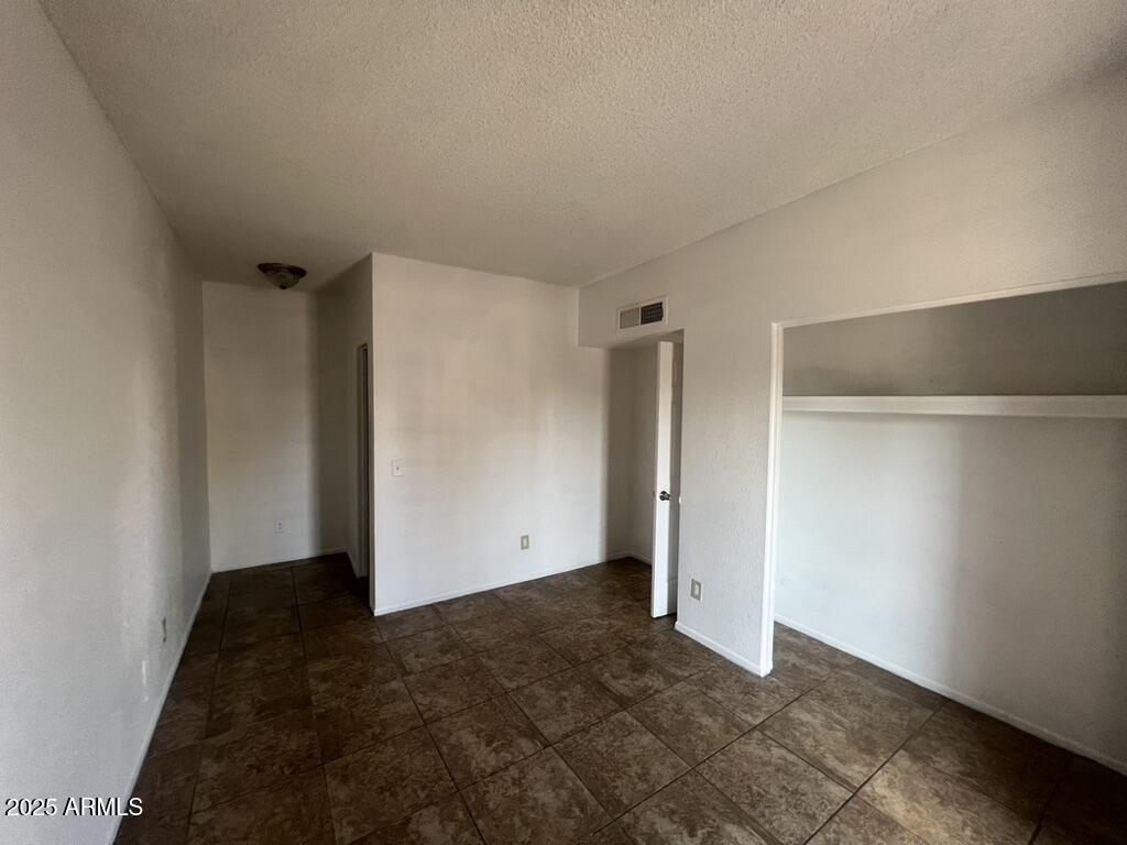 2838 East Marconi Avenue, Unit 203 Phoenix, AZ 85032 - Photo 20 of 22 a view of an empty room
