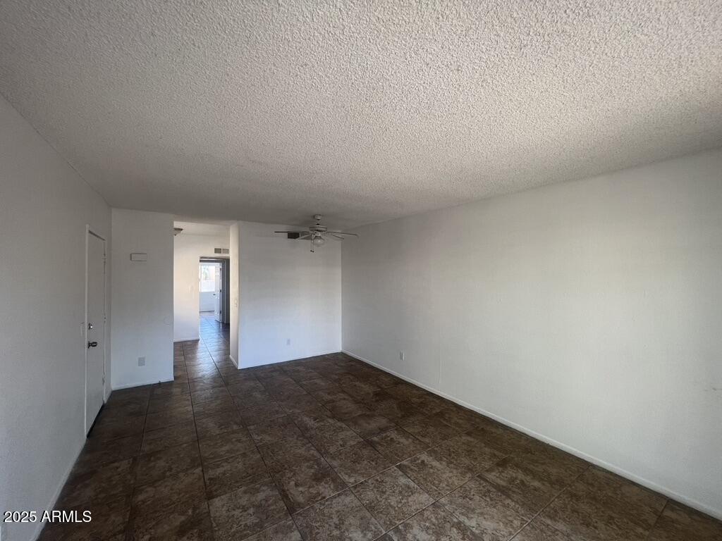 2838 East Marconi Avenue, Unit 203 Phoenix, AZ 85032 - Photo 6 of 22 a view of an empty room and window