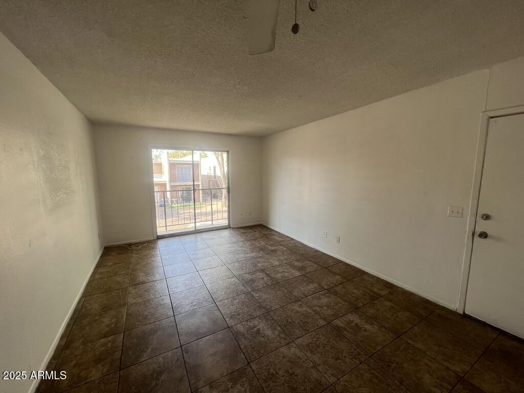 2838 East Marconi Avenue, Unit 203 Phoenix, AZ 85032 - Photo 8 of 22 a view of an empty room and window