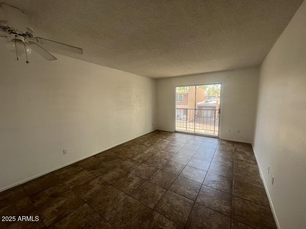 2838 East Marconi Avenue, Unit 203 Phoenix, AZ 85032 - Photo 9 of 22 a view of an empty room and a window