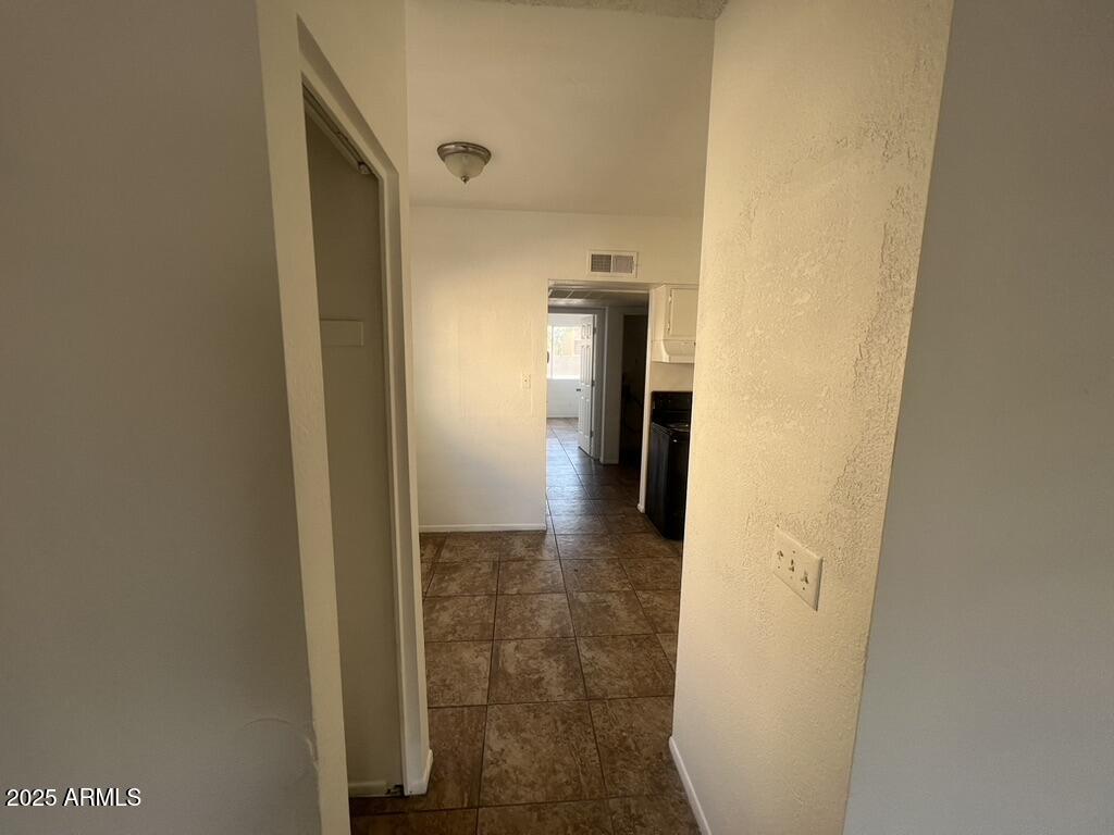 2838 East Marconi Avenue, Unit 203 Phoenix, AZ 85032 - Photo 10 of 22 a view of hallway with wooden floor