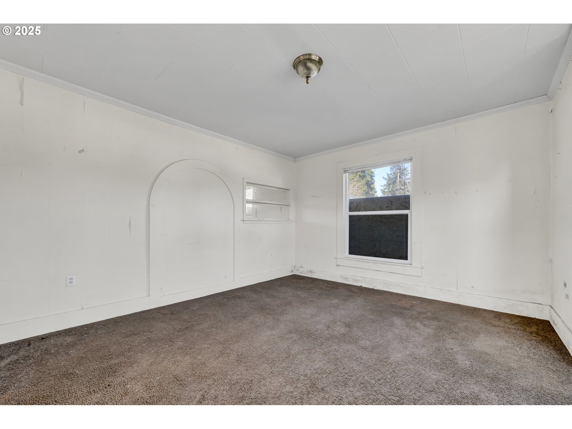 168 North Cleveland Street Eugene, OR 97402 - Photo 17 of 40 a view of empty room with wooden floor