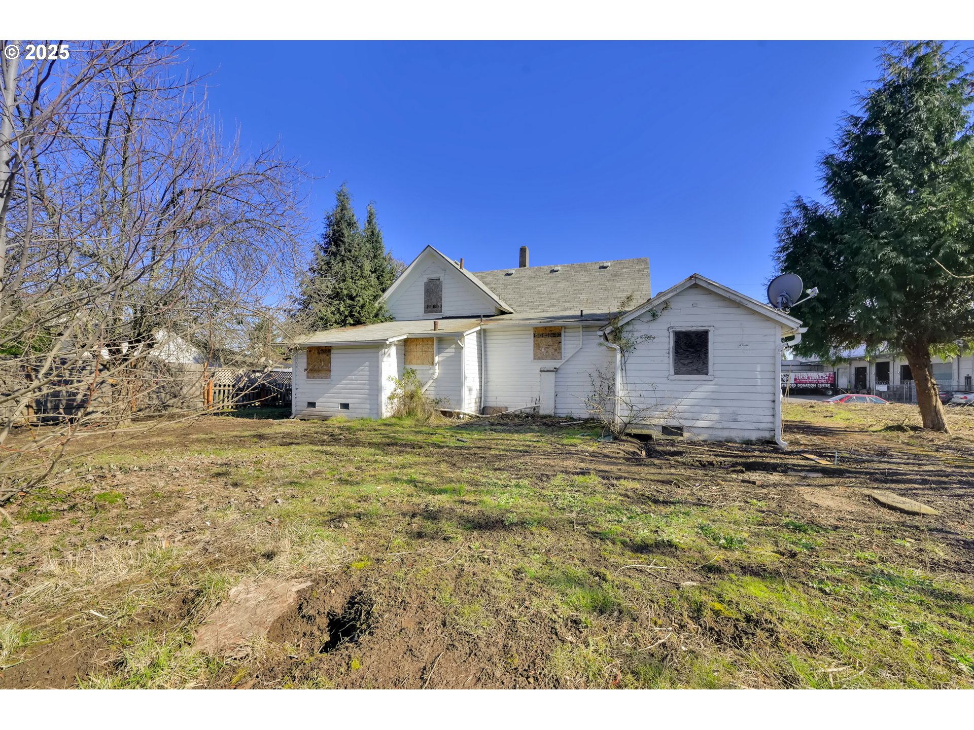 168 North Cleveland Street Eugene, OR 97402 - Photo 36 of 40 a view of a house with a backyard