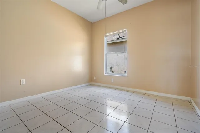 a view of an empty room and window