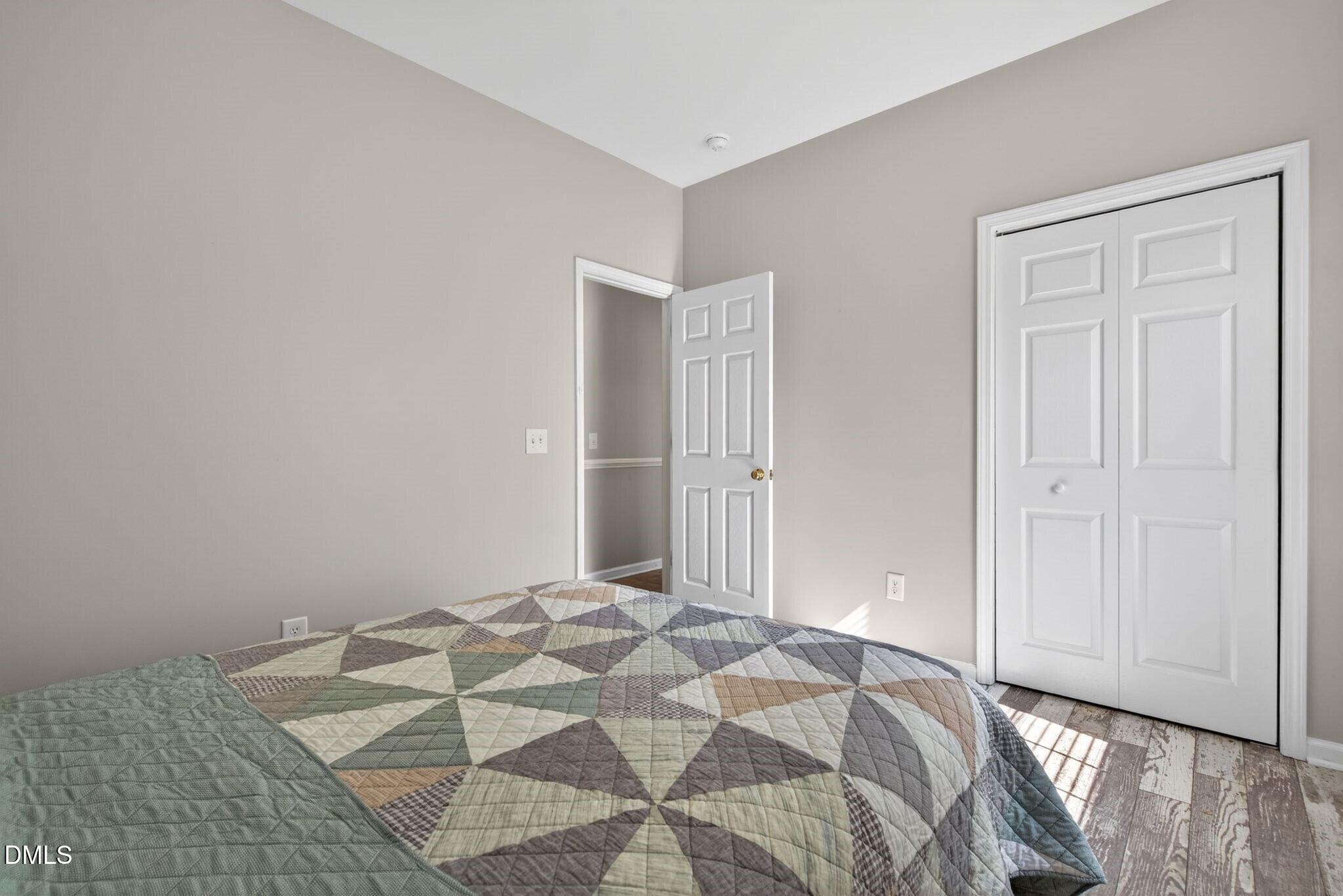 3113 Locust Grove Drive Apex, NC 27539 - Photo 24 of 39 024_44_015primarybedroom