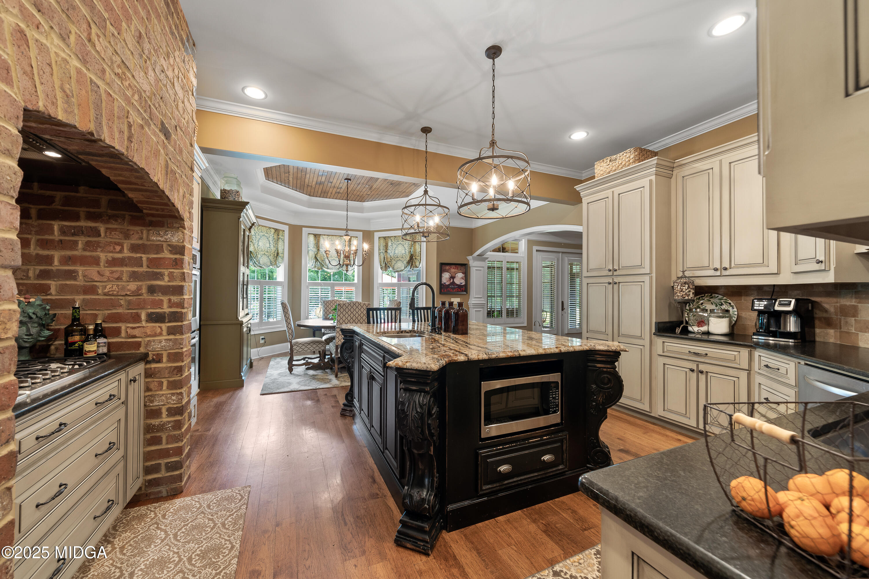 415 Irongate Macon, GA 31220 - Photo 12 of 56 a kitchen with stainless steel appliances granite countertop a stove and a sink