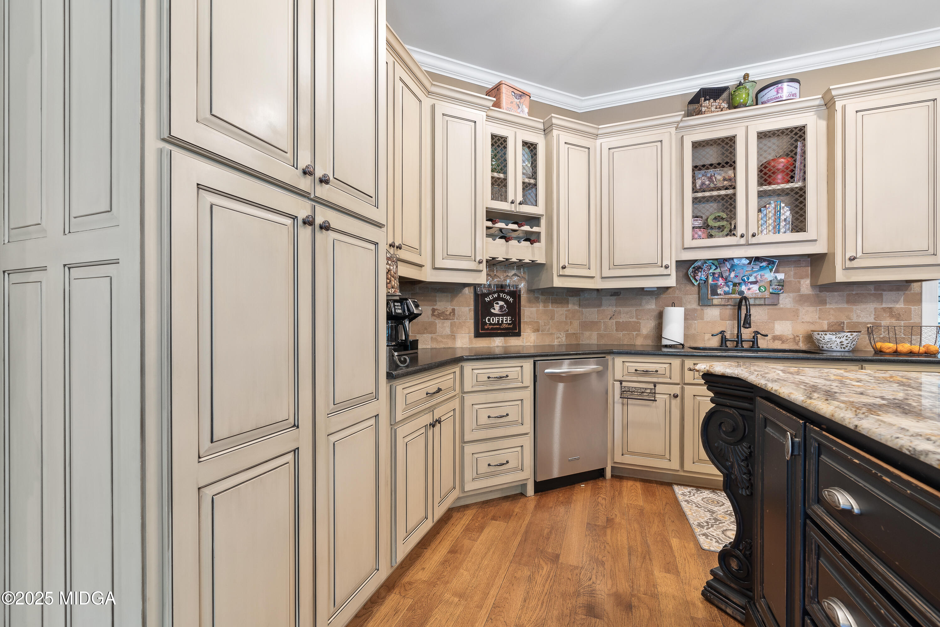 415 Irongate Macon, GA 31220 - Photo 14 of 56 a kitchen with stainless steel appliances granite countertop white cabinets and window