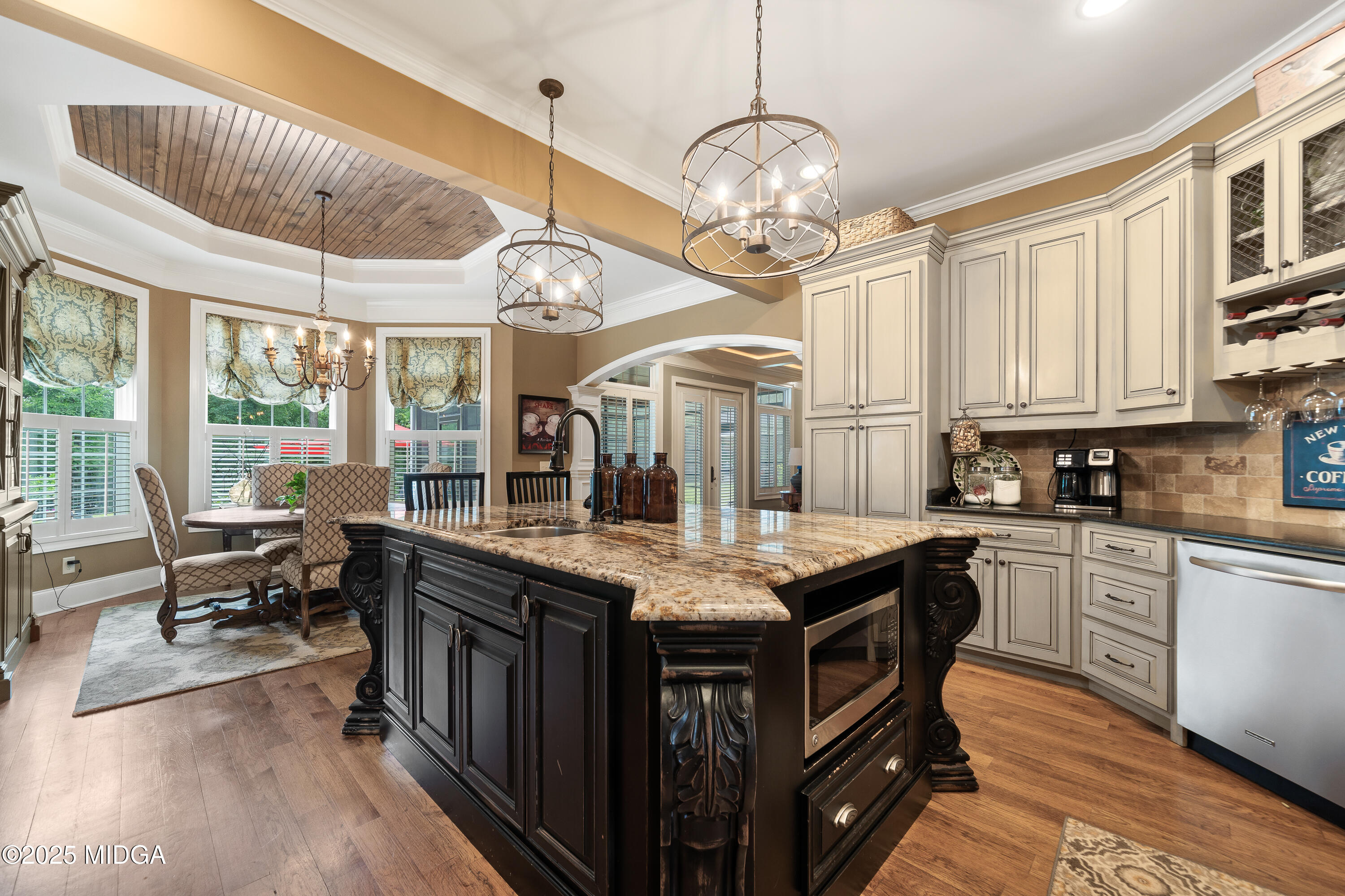 415 Irongate Macon, GA 31220 - Photo 15 of 56 a kitchen with stainless steel appliances granite countertop a stove and cabinets