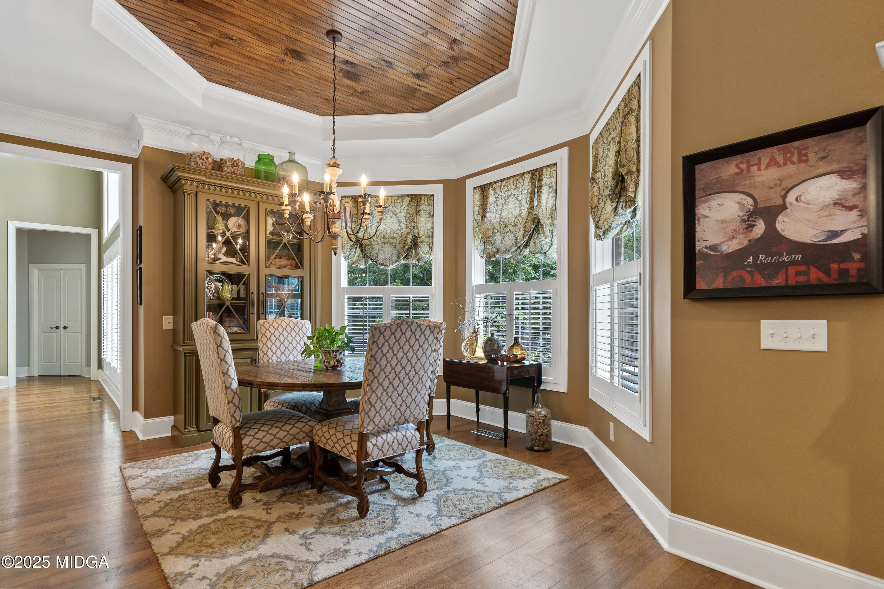 415 Irongate Macon, GA 31220 - Photo 18 of 56 a dining room with furniture wooden floor and a rug