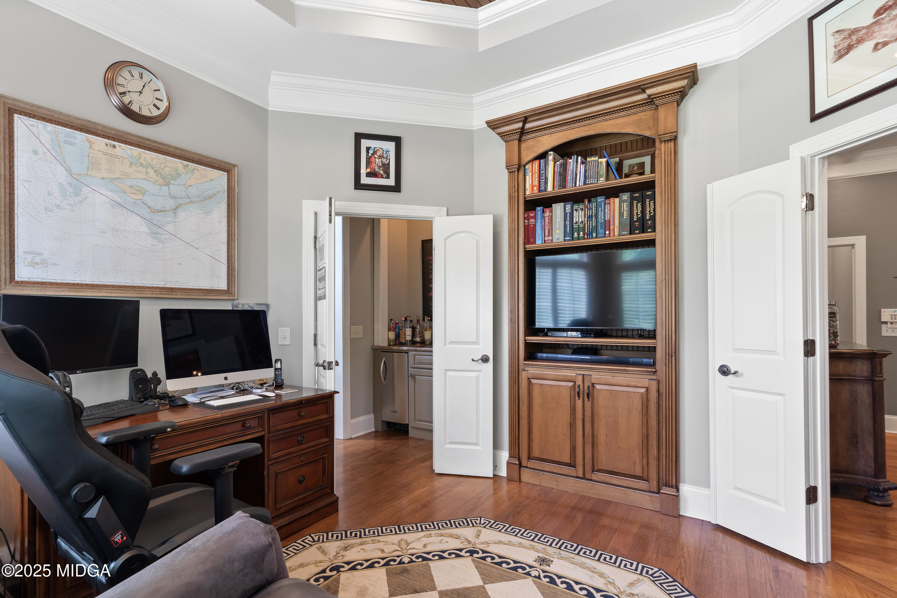 415 Irongate Macon, GA 31220 - Photo 25 of 56 a view of a workspace with furniture and wooden floor