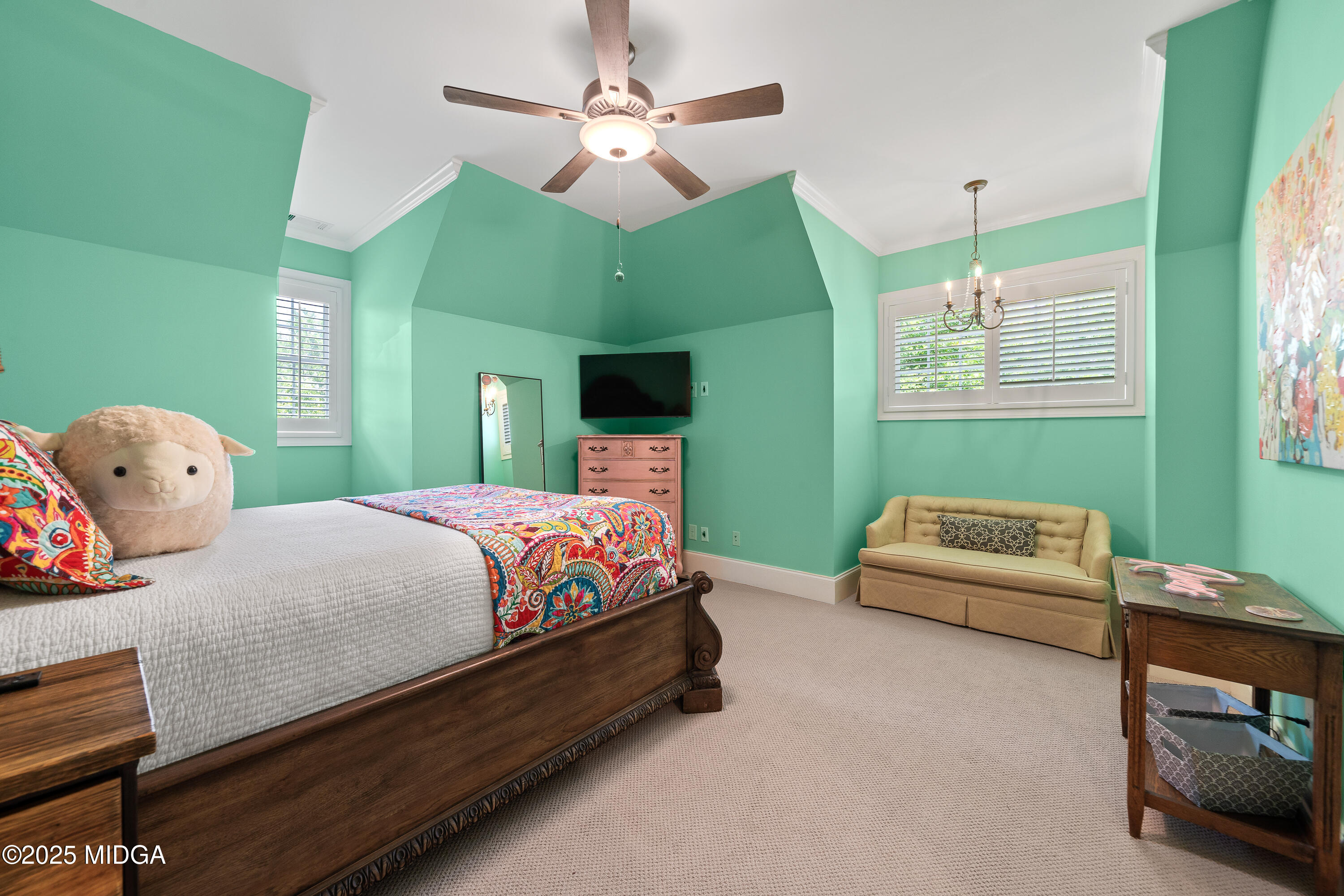 415 Irongate Macon, GA 31220 - Photo 38 of 56 a bedroom with a bed and a chandelier