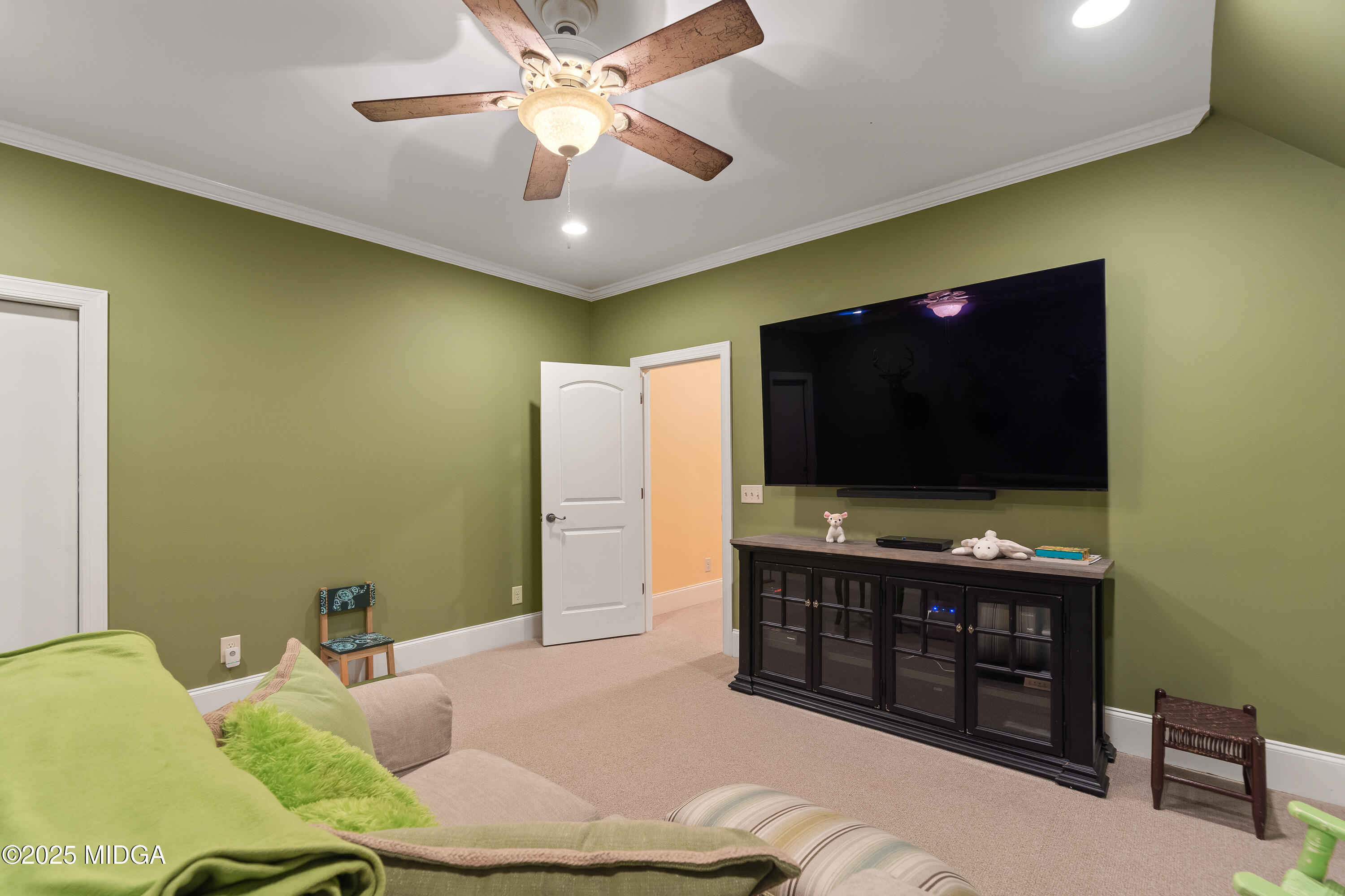 415 Irongate Macon, GA 31220 - Photo 46 of 56 a living room with furniture and a flat screen tv