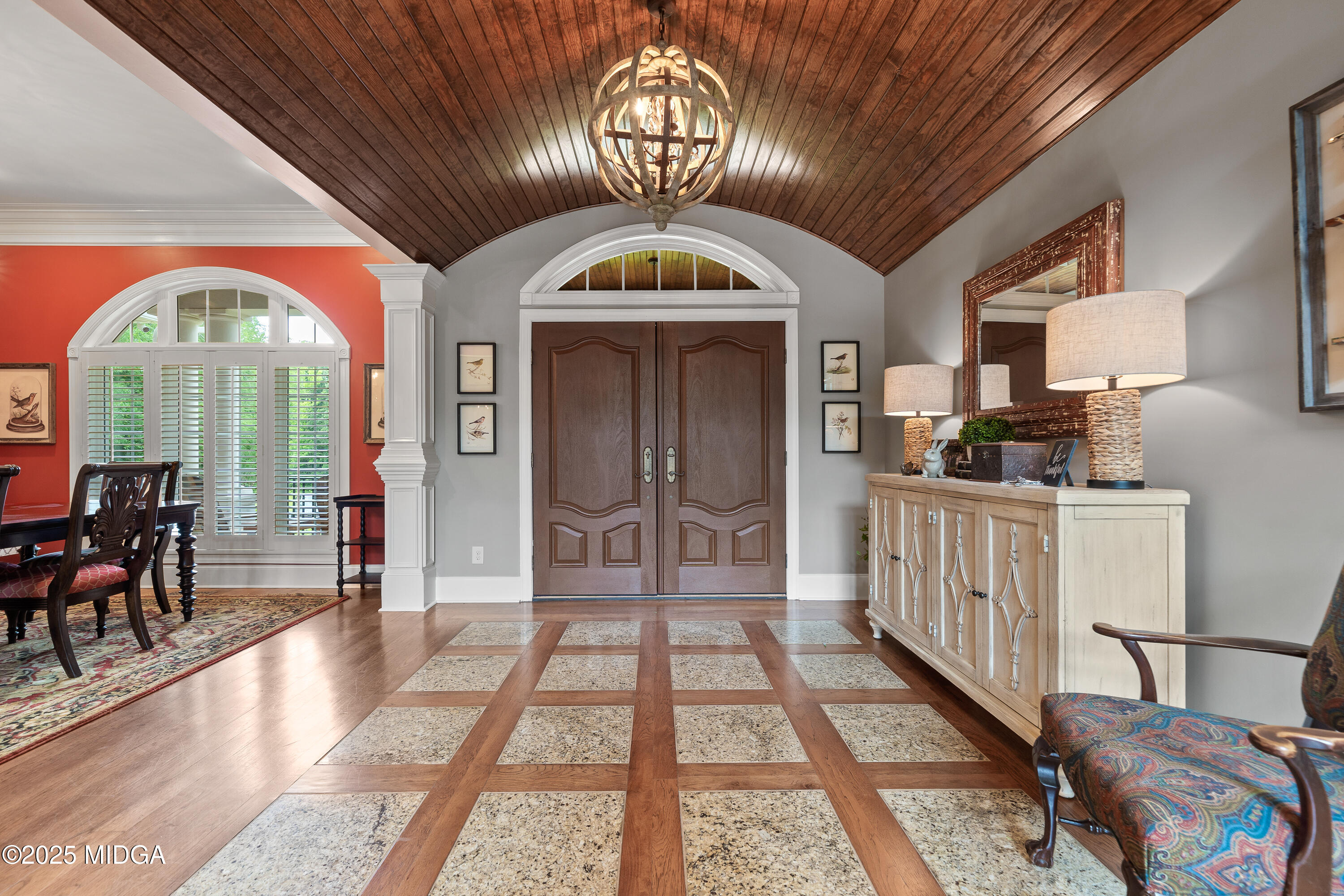 415 Irongate Macon, GA 31220 - Photo 5 of 56 a view of a livingroom with furniture cabinet and a floor to ceiling window